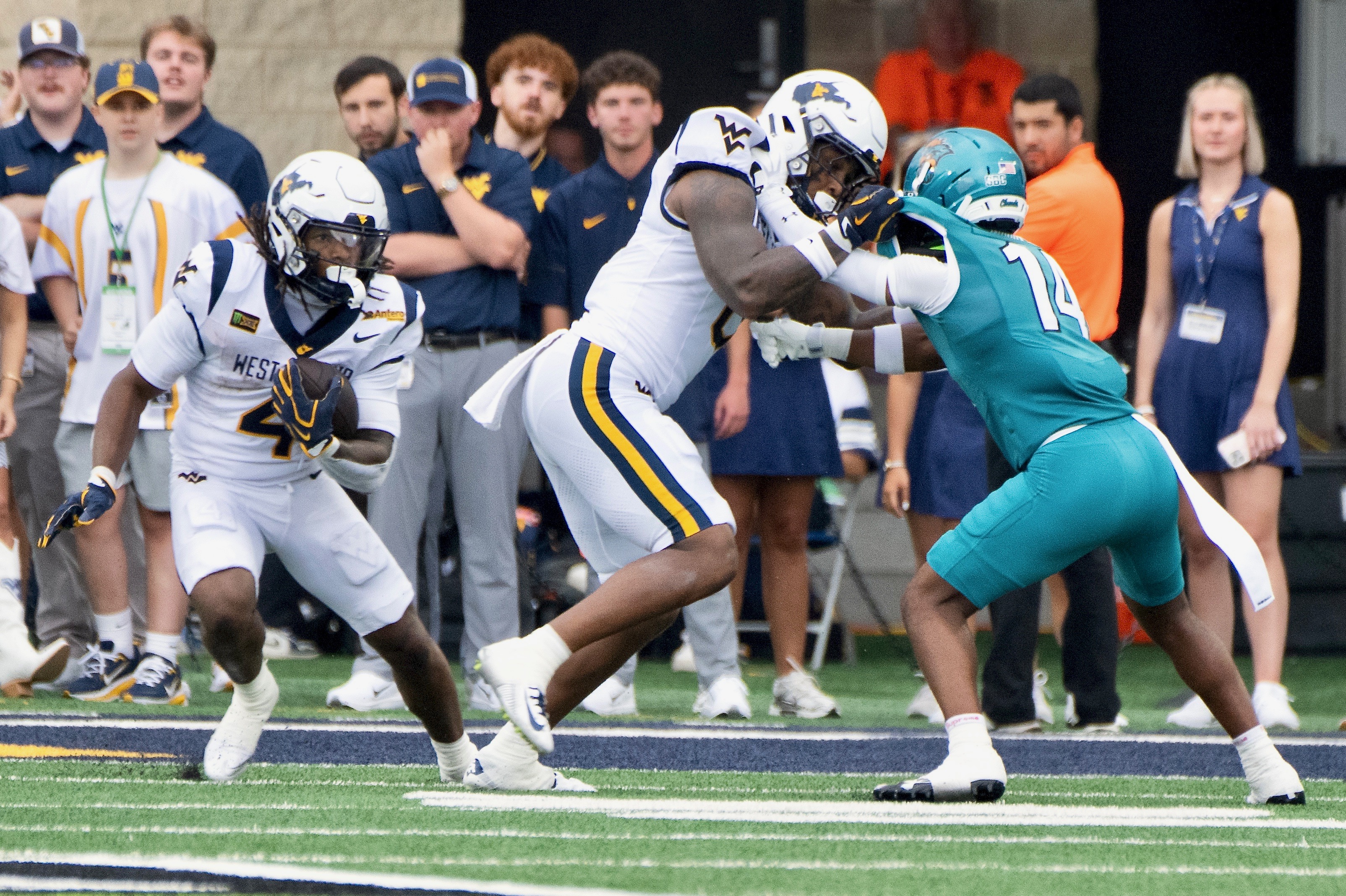 West Virginia rolls past U.T. Martin, 52-7